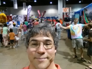 Me at the expo...getting photo bombed by the guy in the tie dye shirt